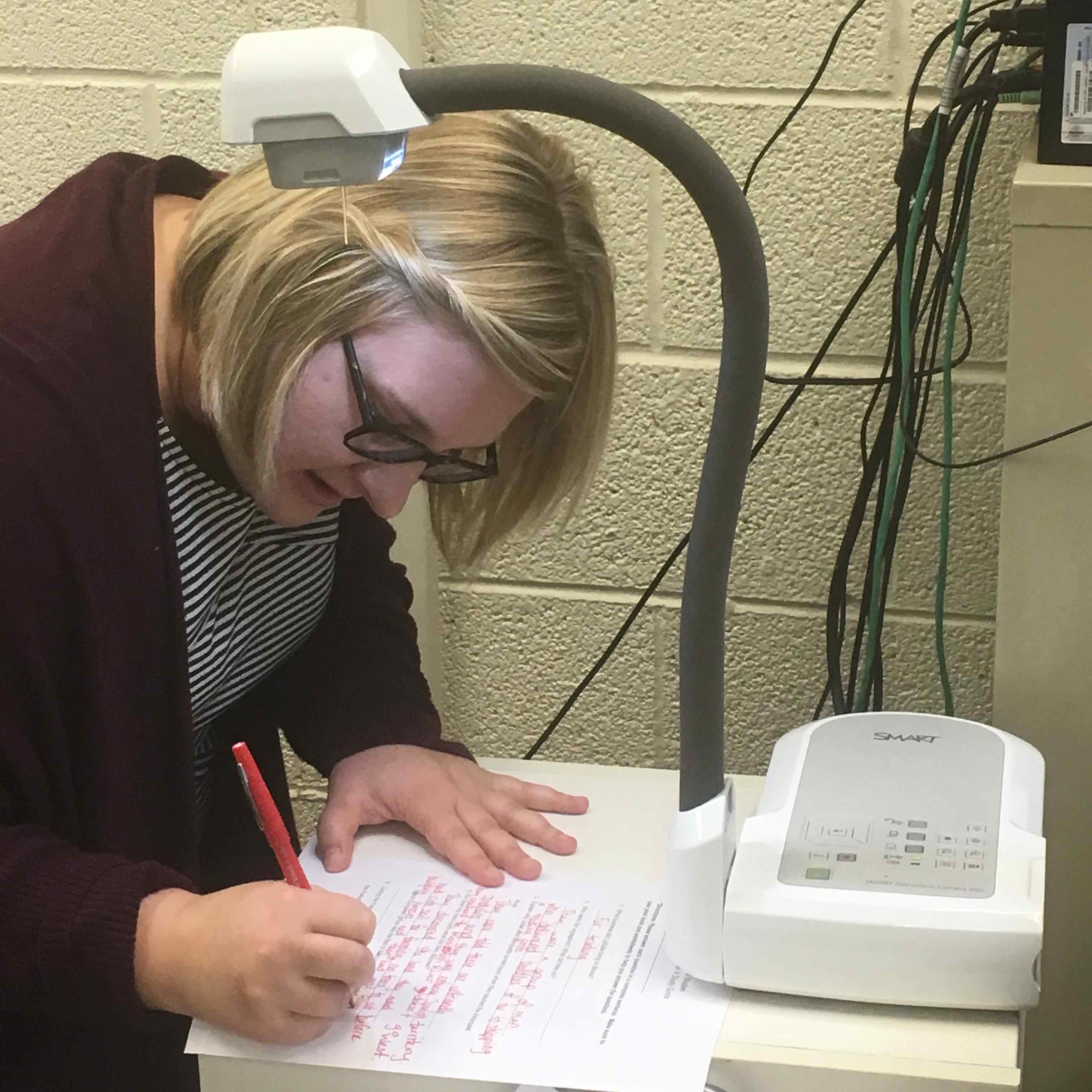 Teacher using document scanner